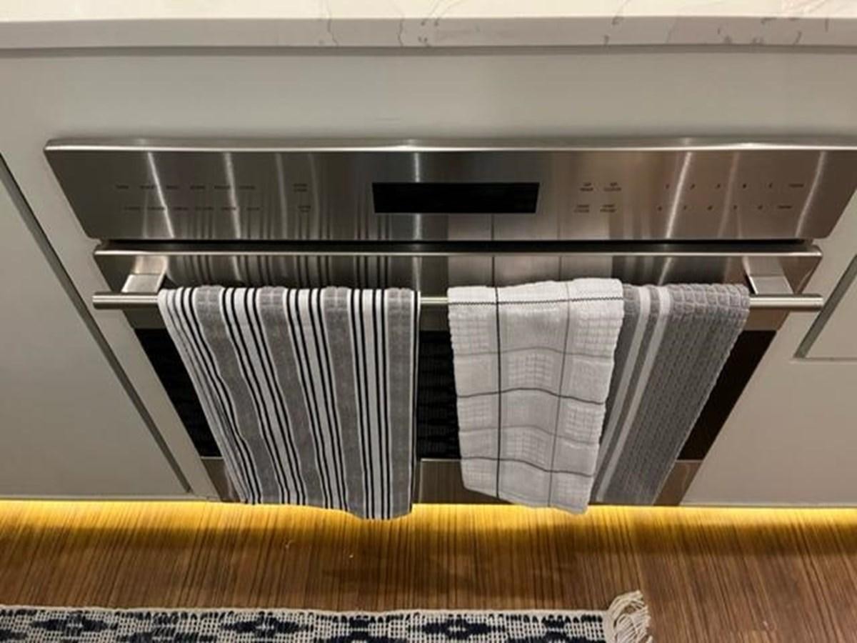 a dishwasher with a towel from it aboard CENTURY STAR Yacht for Sale