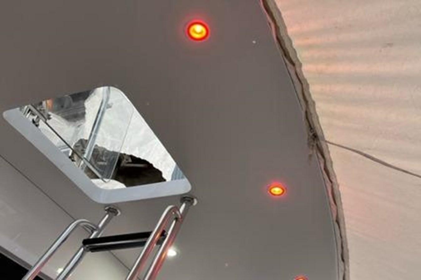 a car with a red light aboard CENTURY STAR Yacht for Sale