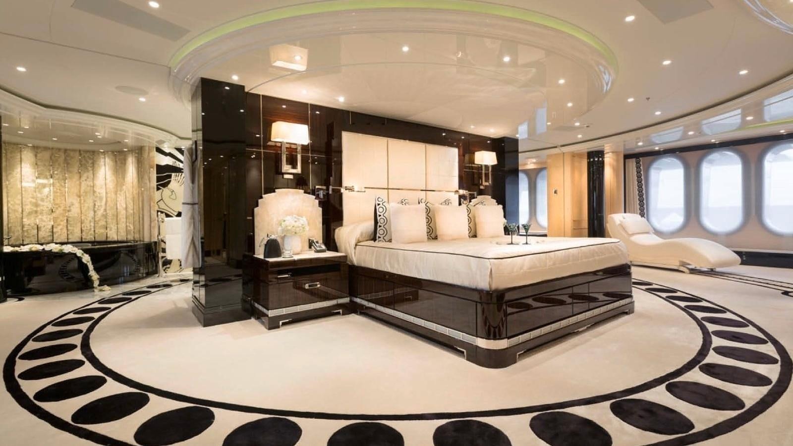 a large bedroom with a large bed aboard PHOENIX 2 Yacht for Sale
