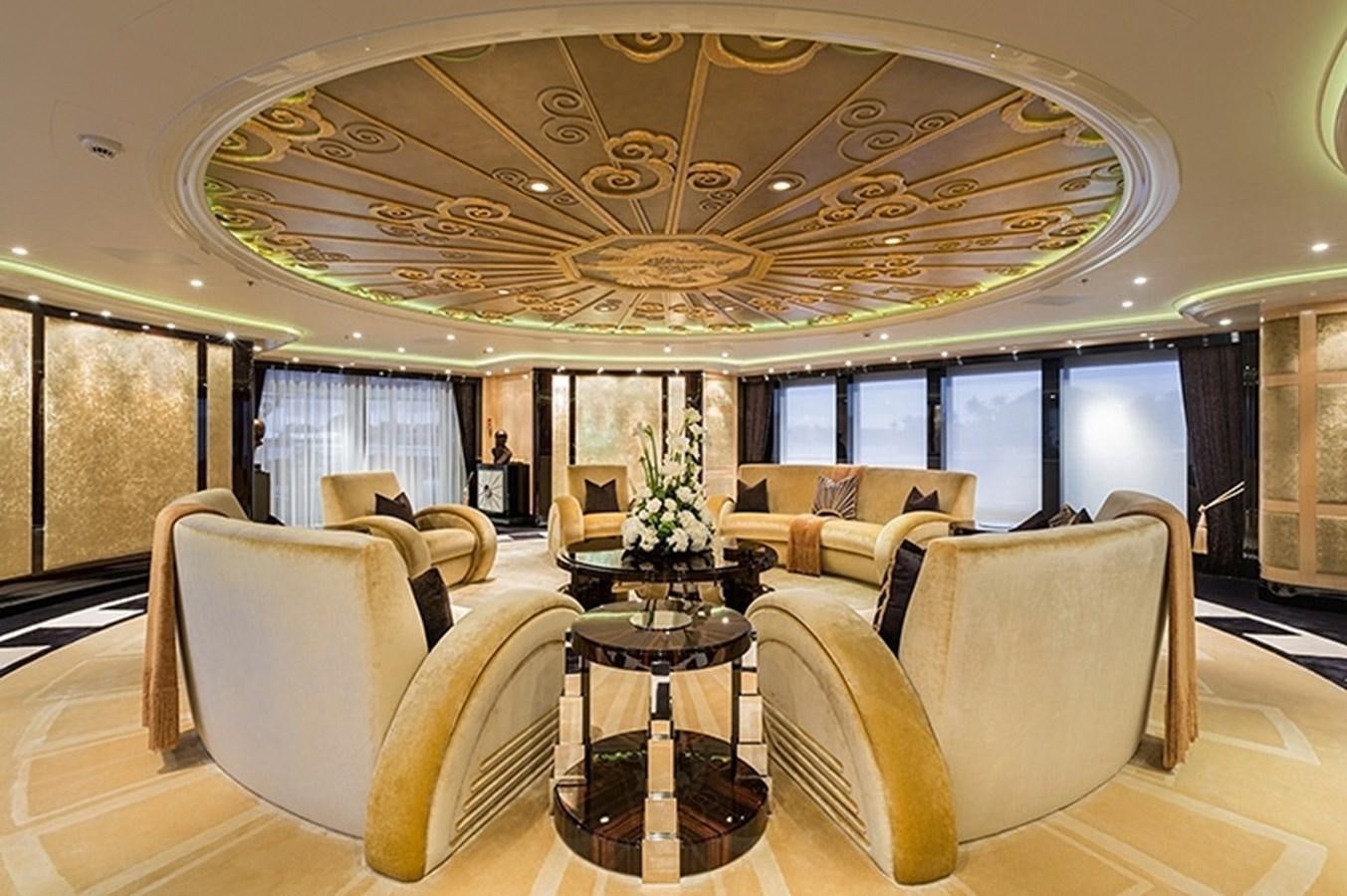 a large room with a chandelier aboard PHOENIX 2 Yacht for Sale