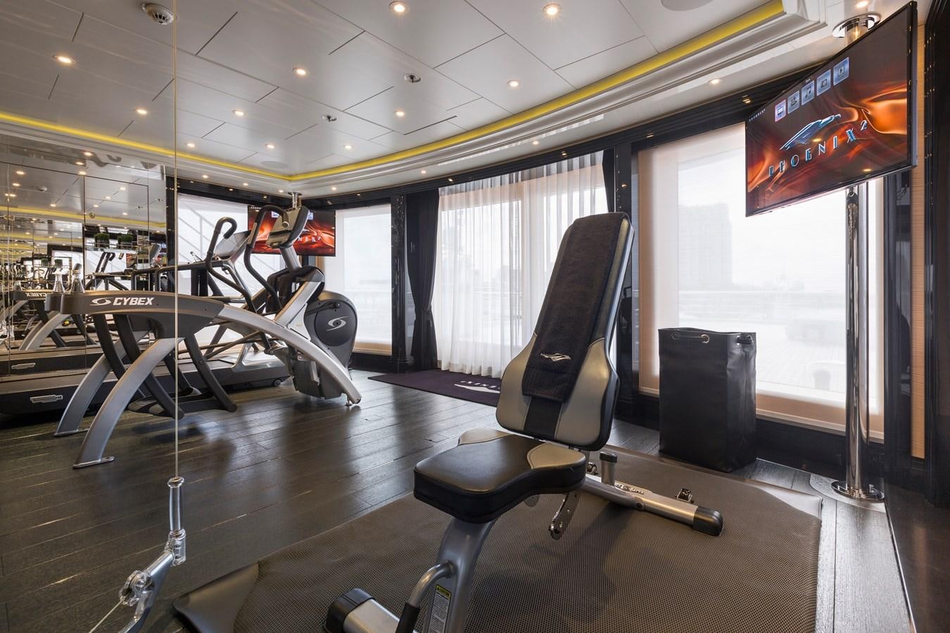 exercise equipment in a room aboard PHOENIX 2 Yacht for Sale