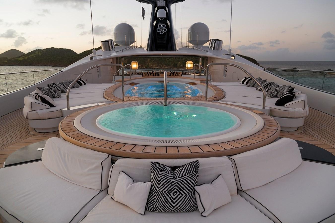 a large swimming pool on a boat aboard PHOENIX 2 Yacht for Sale