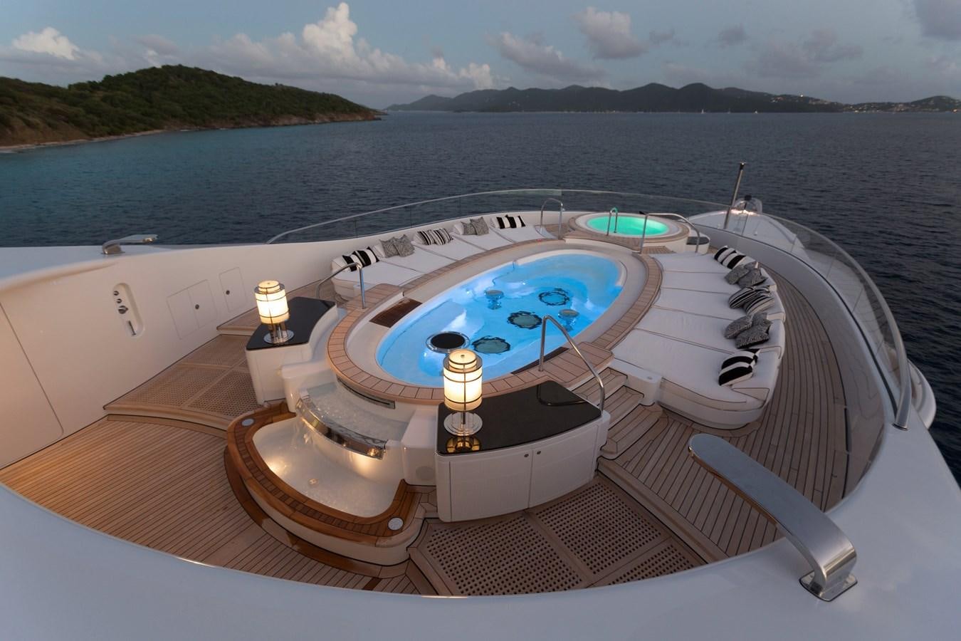 a swimming pool on a deck aboard PHOENIX 2 Yacht for Sale