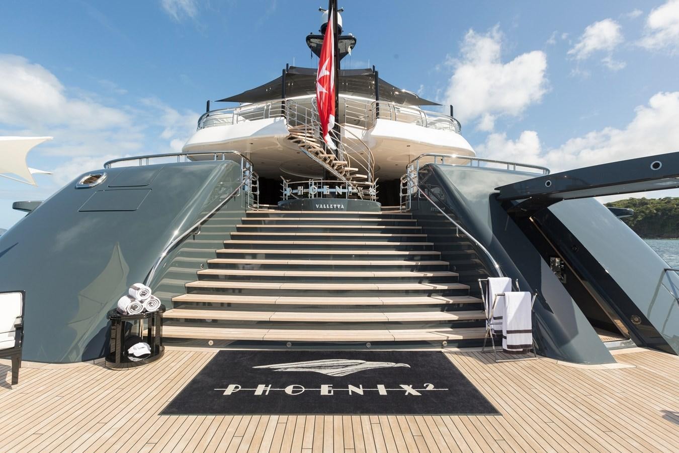 a flight of stairs leading to a plane aboard PHOENIX 2 Yacht for Sale