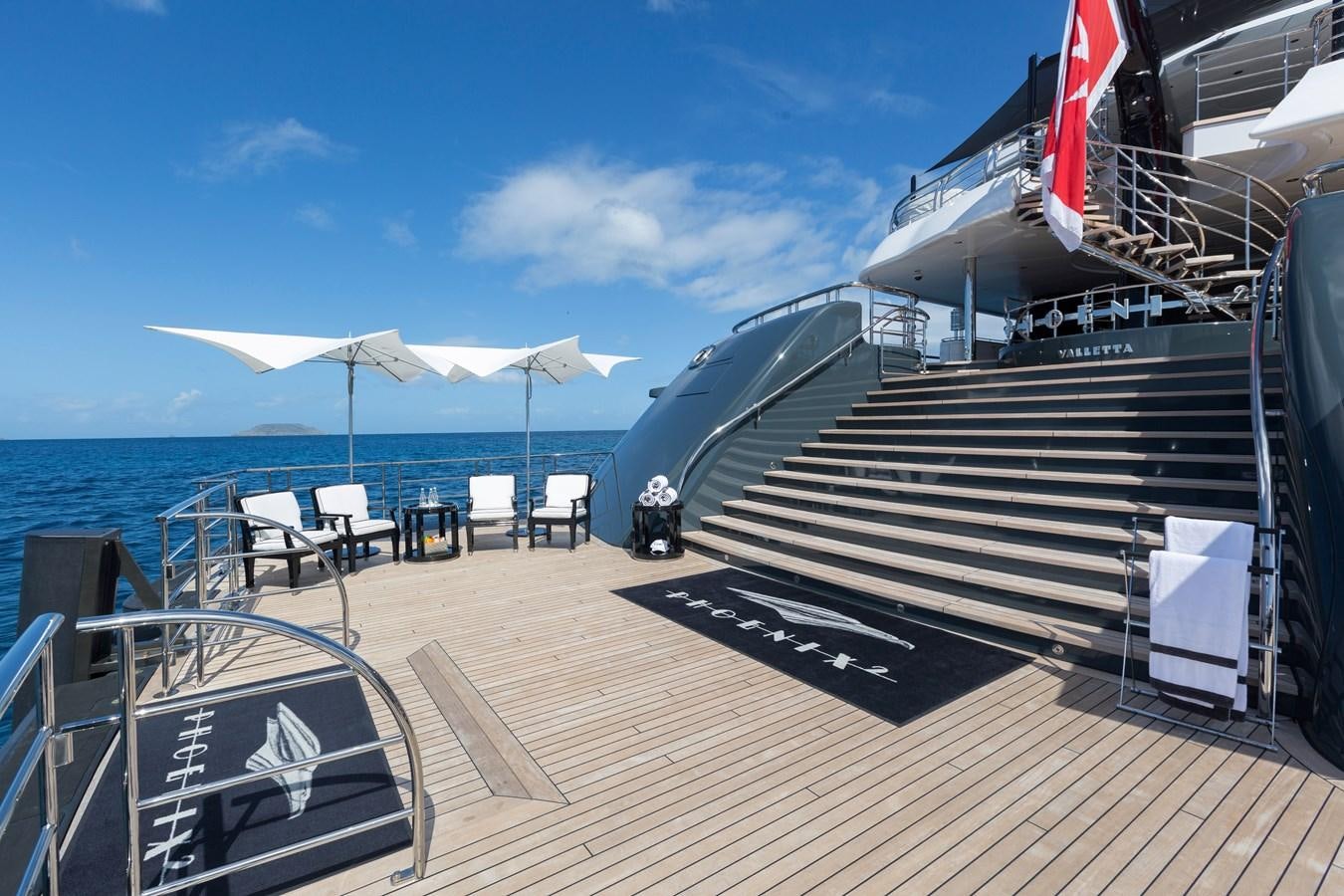 a boat on a deck aboard PHOENIX 2 Yacht for Sale