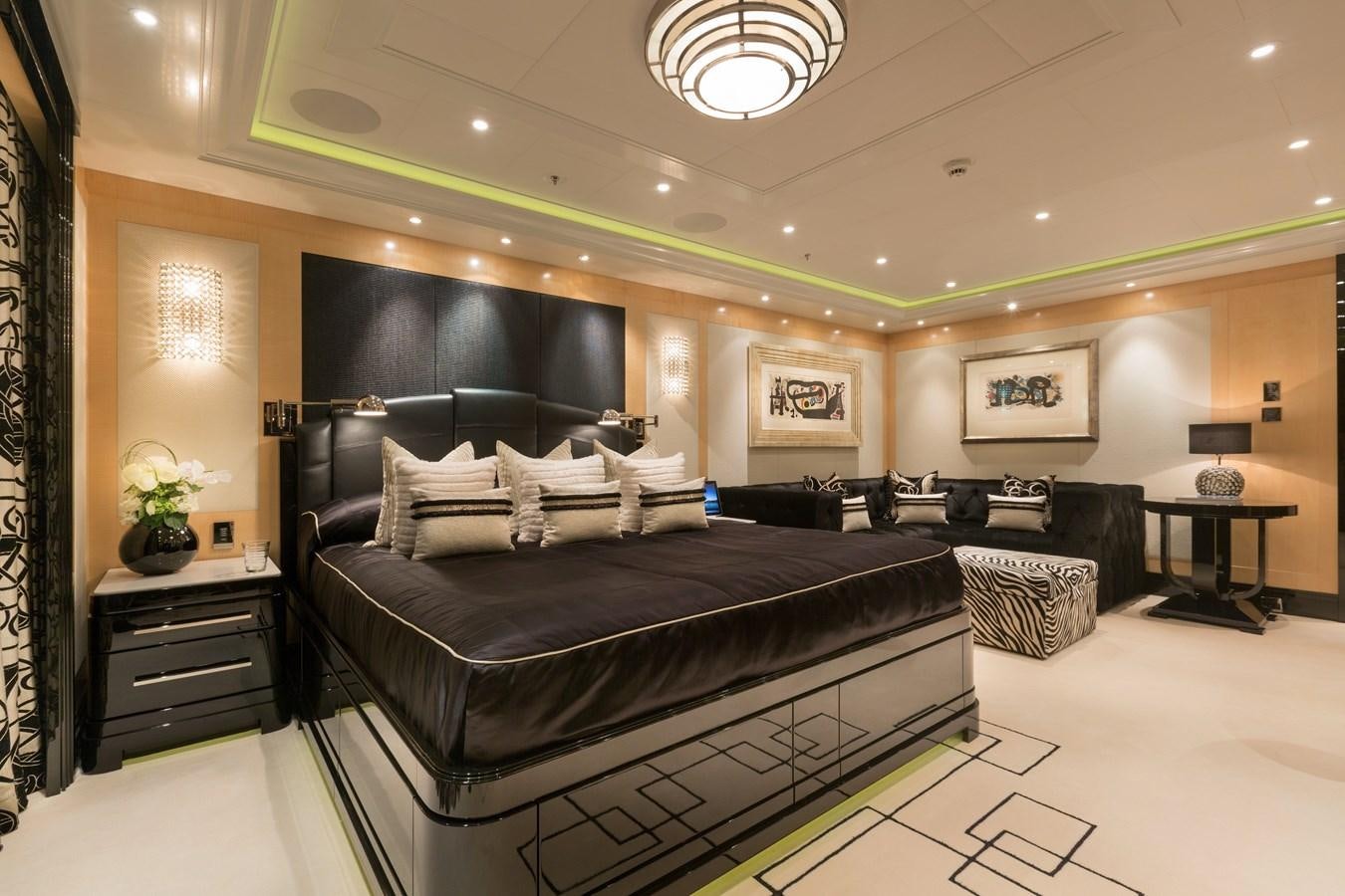 a large bedroom with a large bed aboard PHOENIX 2 Yacht for Sale