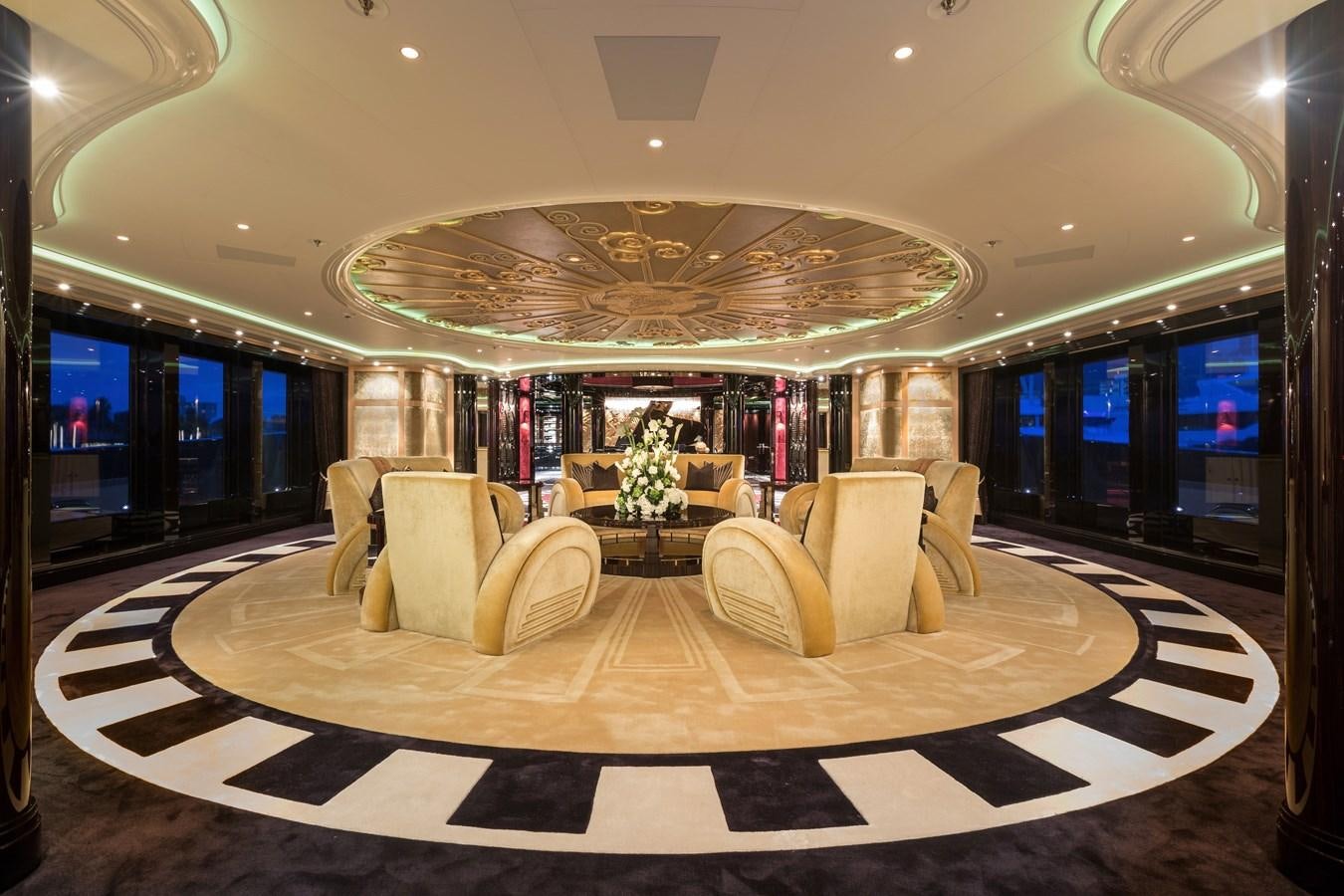 a large room with a large chandelier aboard PHOENIX 2 Yacht for Sale