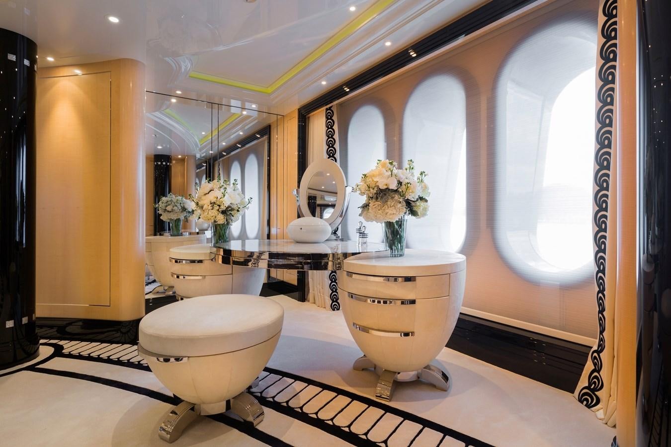 a bathroom with a large mirror aboard PHOENIX 2 Yacht for Sale