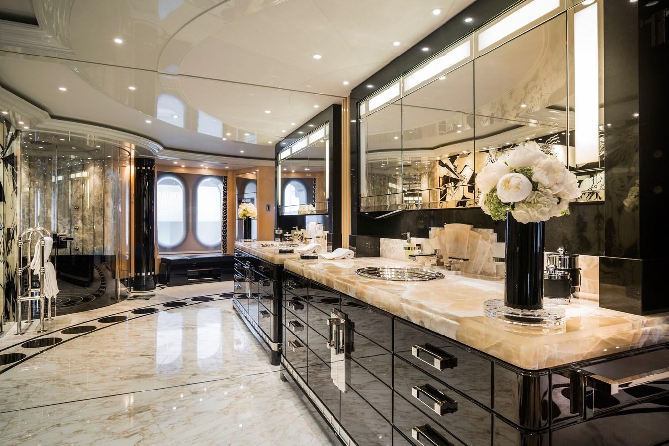 a large kitchen with marble counters aboard PHOENIX 2 Yacht for Sale