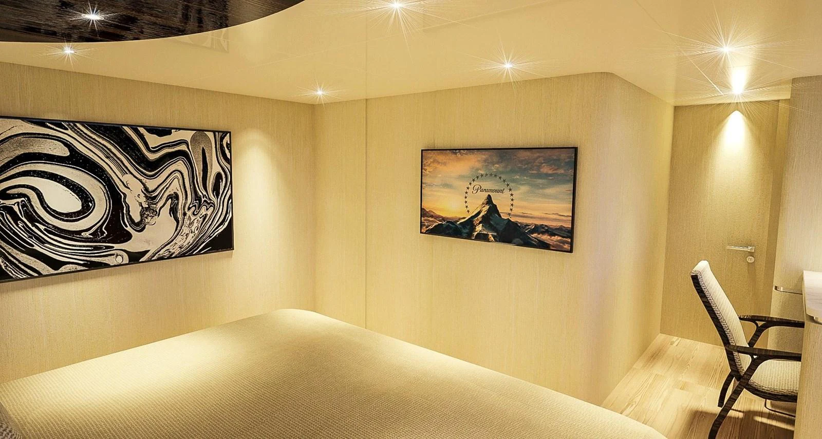 a bed with paintings on the wall aboard CUSTOM Yacht for Sale