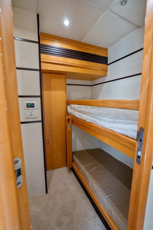 a room with bunk beds aboard DENISE Yacht for Sale
