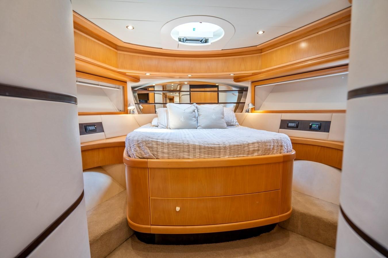 a bed in a room aboard DENISE Yacht for Sale