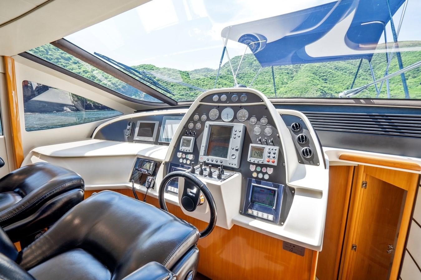 inside of a car aboard DENISE Yacht for Sale