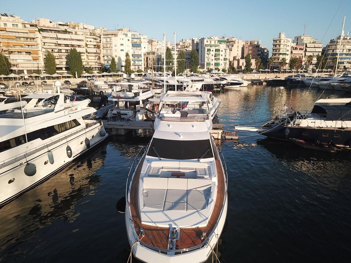 boats in a harbor aboard GOLDINIA Yacht for Sale