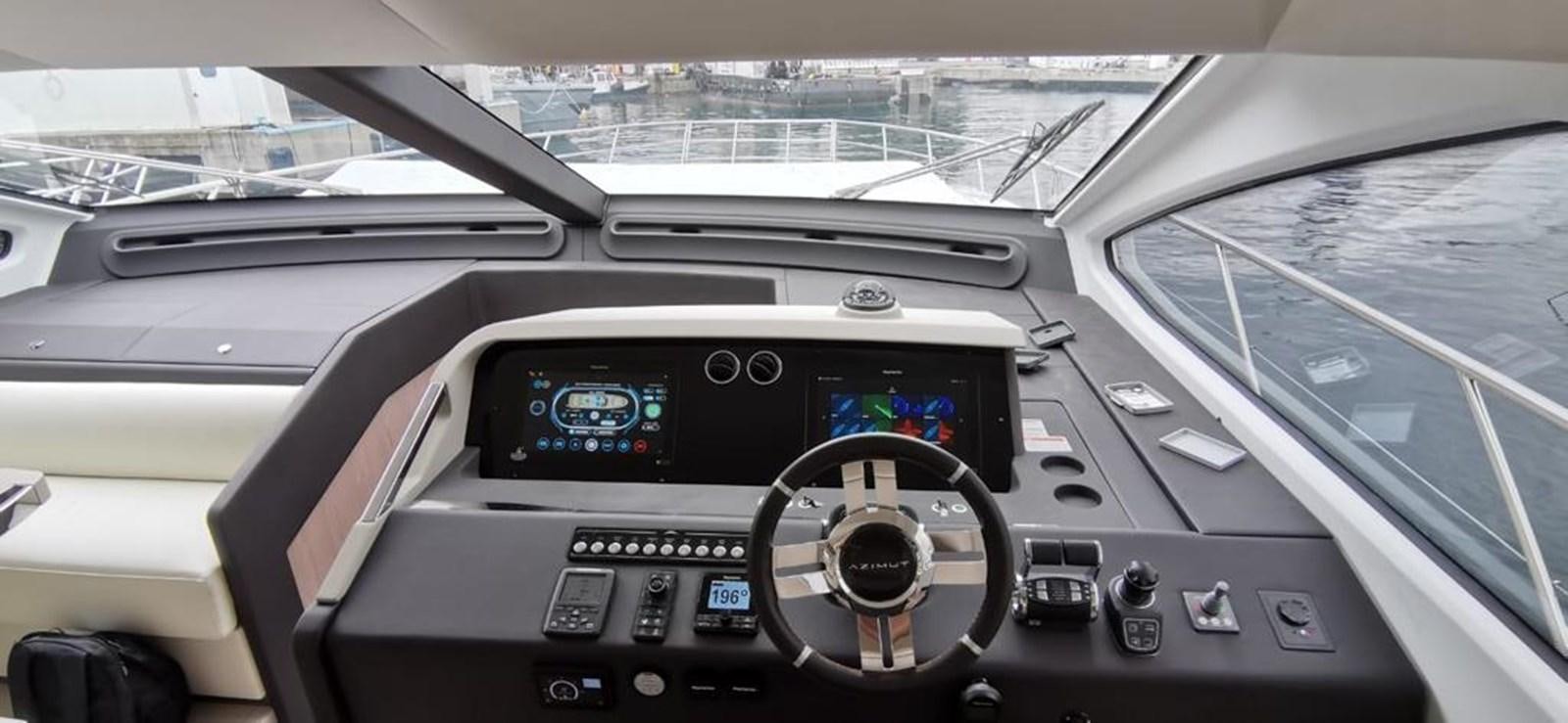 inside of a car aboard GOLDINIA Yacht for Sale