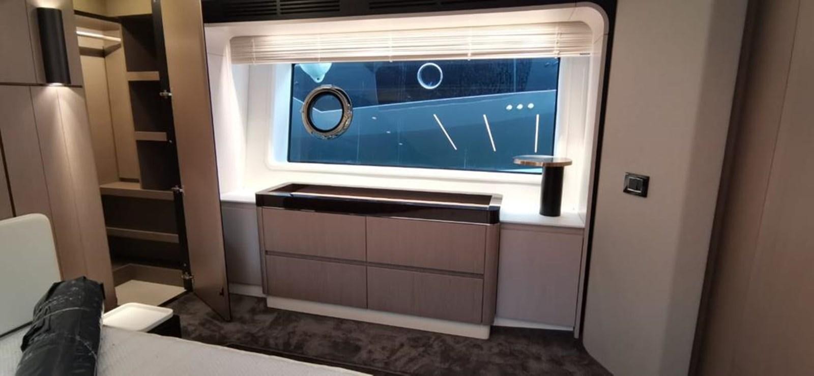 a room with a blue screen aboard GOLDINIA Yacht for Sale