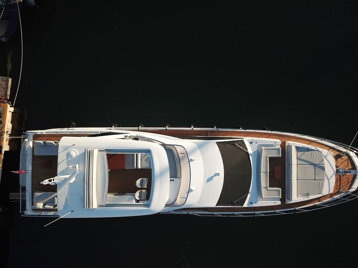 a white and blue boat aboard GOLDINIA Yacht for Sale