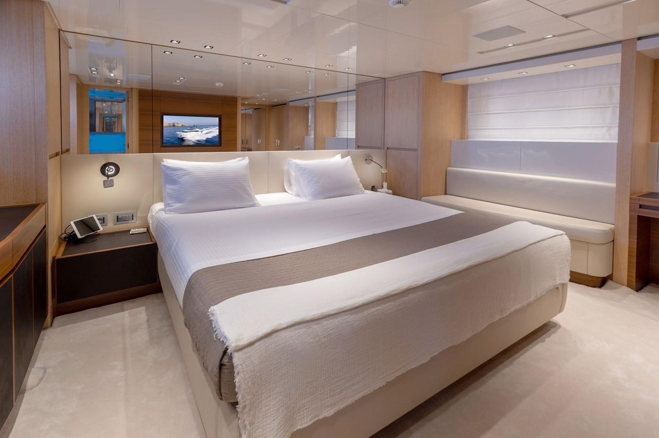 a bed in a room aboard VITTORIA I Yacht for Sale