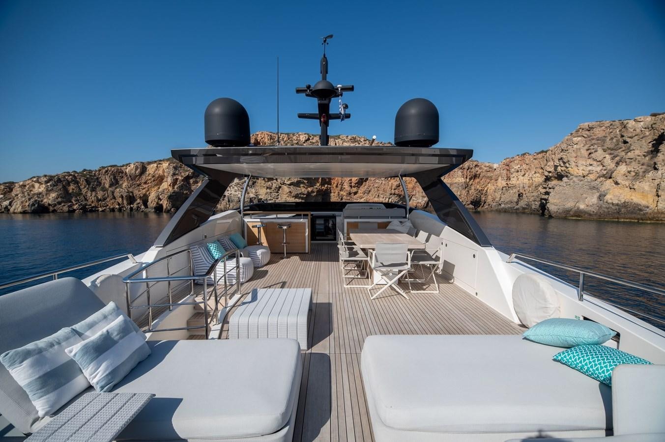a deck with a large boat and a large statue on top aboard VITTORIA I Yacht for Sale
