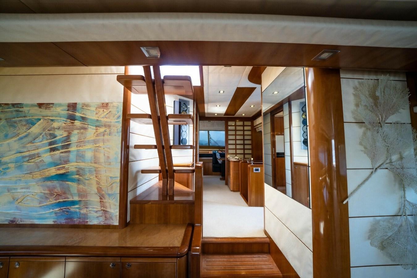 a room with wood floors and wood walls aboard DAY DREAM Yacht for Sale