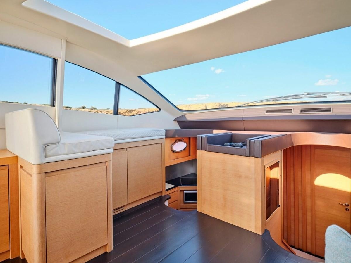 a room with a bed and cabinets aboard SPLENDID V Yacht for Sale