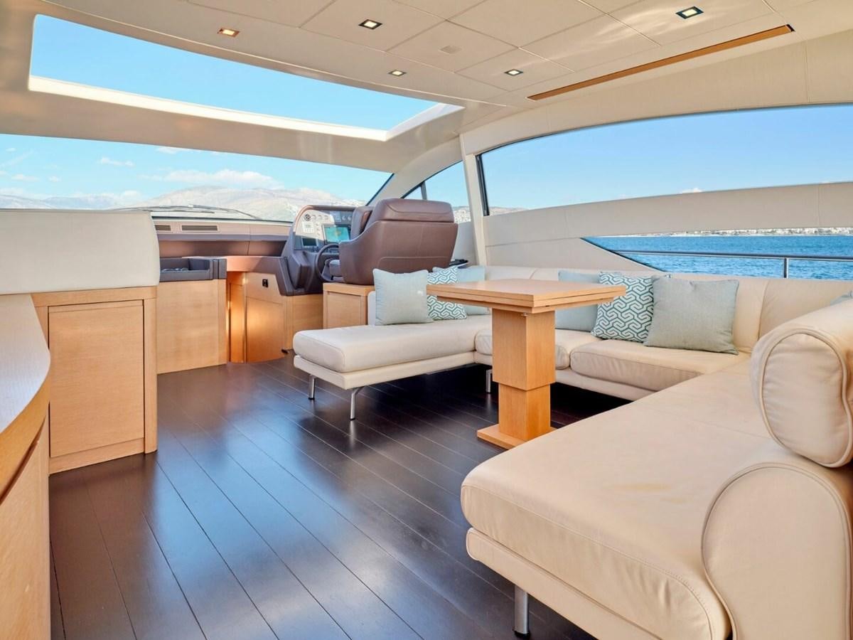 a living room with a couch and a table aboard SPLENDID V Yacht for Sale