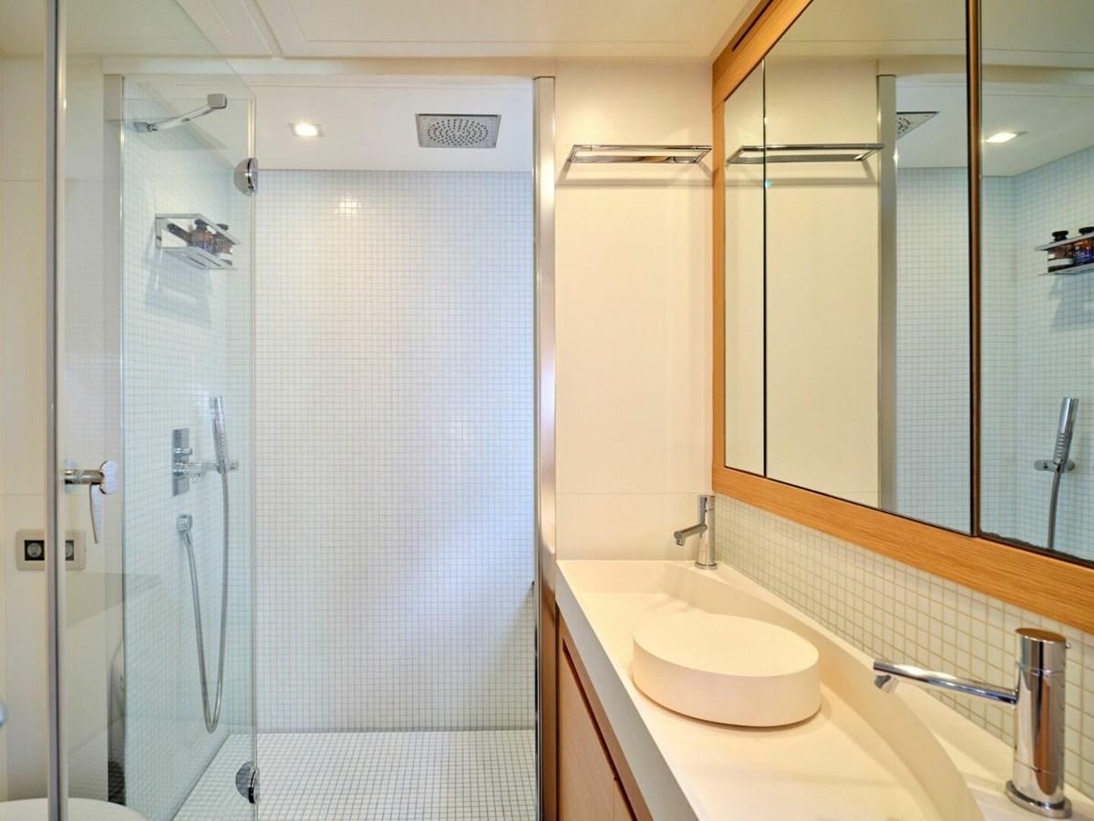 a bathroom with a sink and a shower aboard SPLENDID V Yacht for Sale