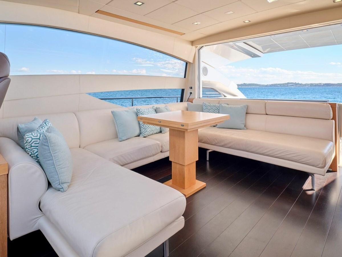 a room with a couch and a table aboard SPLENDID V Yacht for Sale