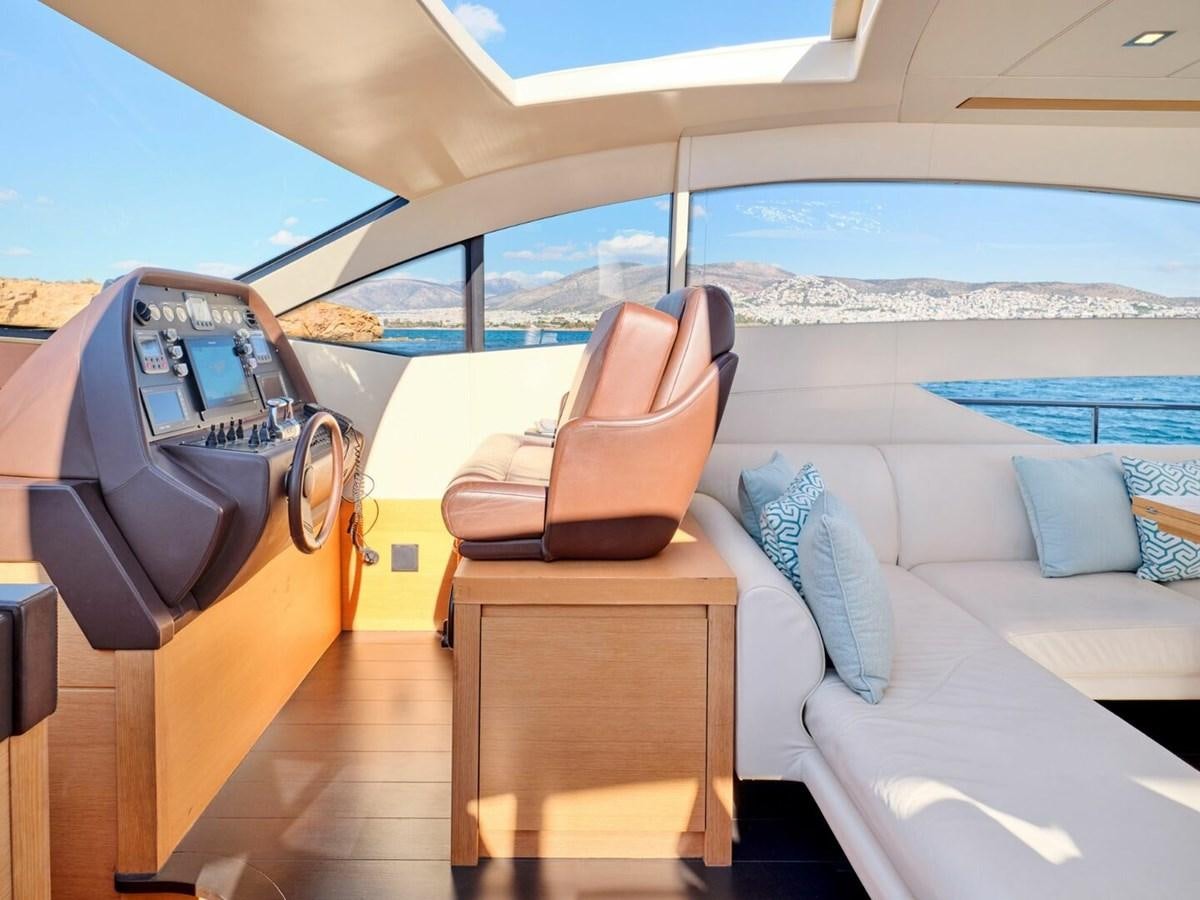 a room with a couch and a chair aboard SPLENDID V Yacht for Sale