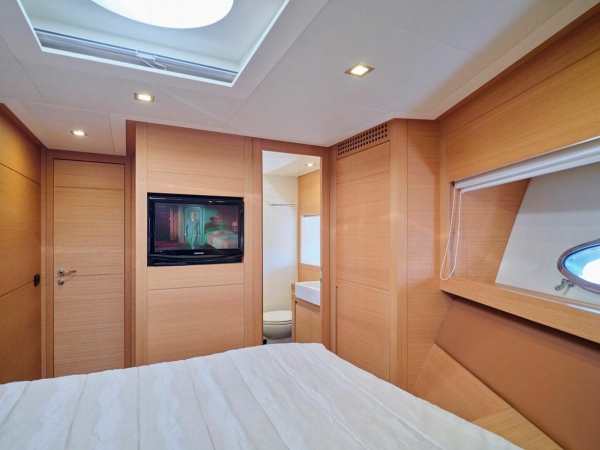 a bed in a room aboard SPLENDID V Yacht for Sale