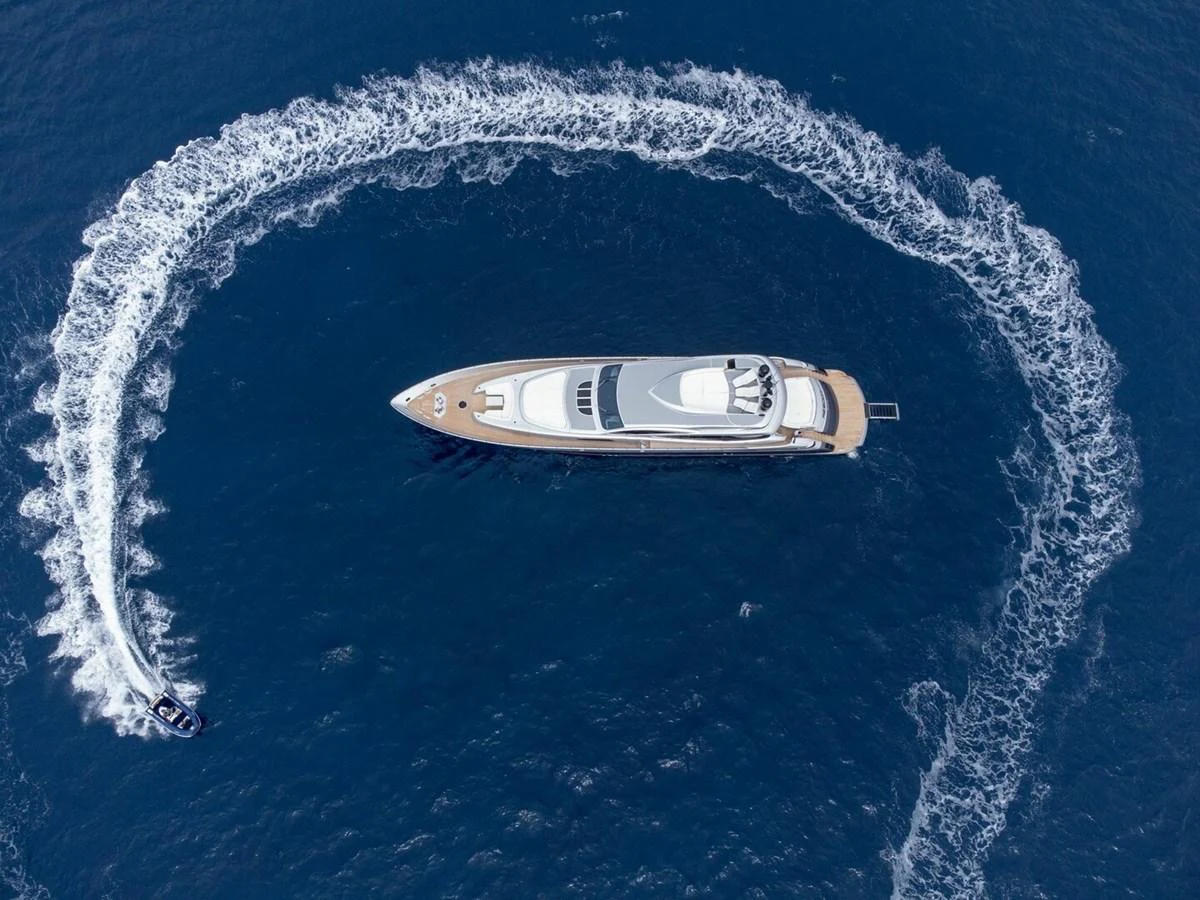 a plane flying over water aboard REBOOT Yacht for Sale