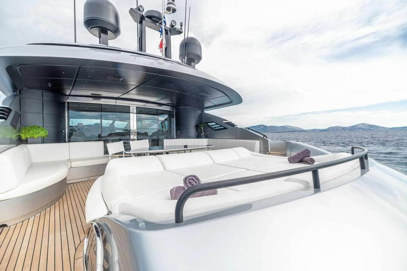 a boat on a deck aboard REBOOT Yacht for Sale