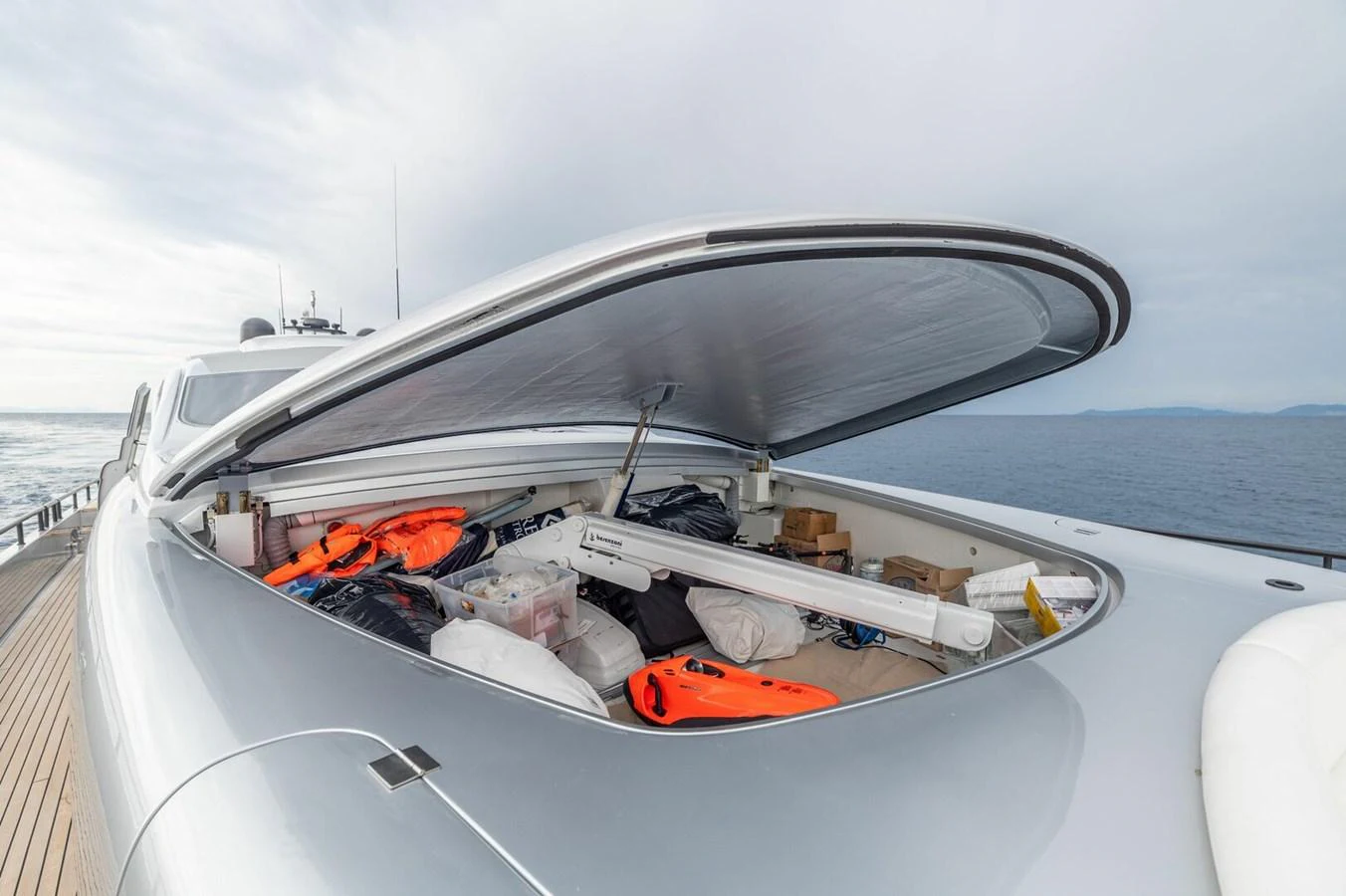 a boat with a lot of items on it aboard REBOOT Yacht for Sale