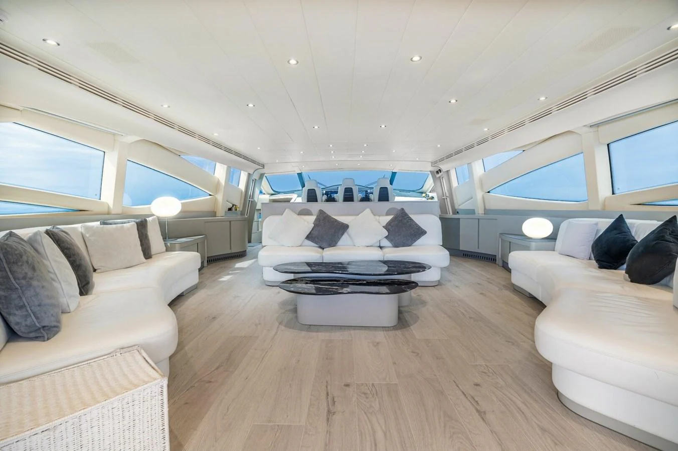 a living room with a large window aboard REBOOT Yacht for Sale