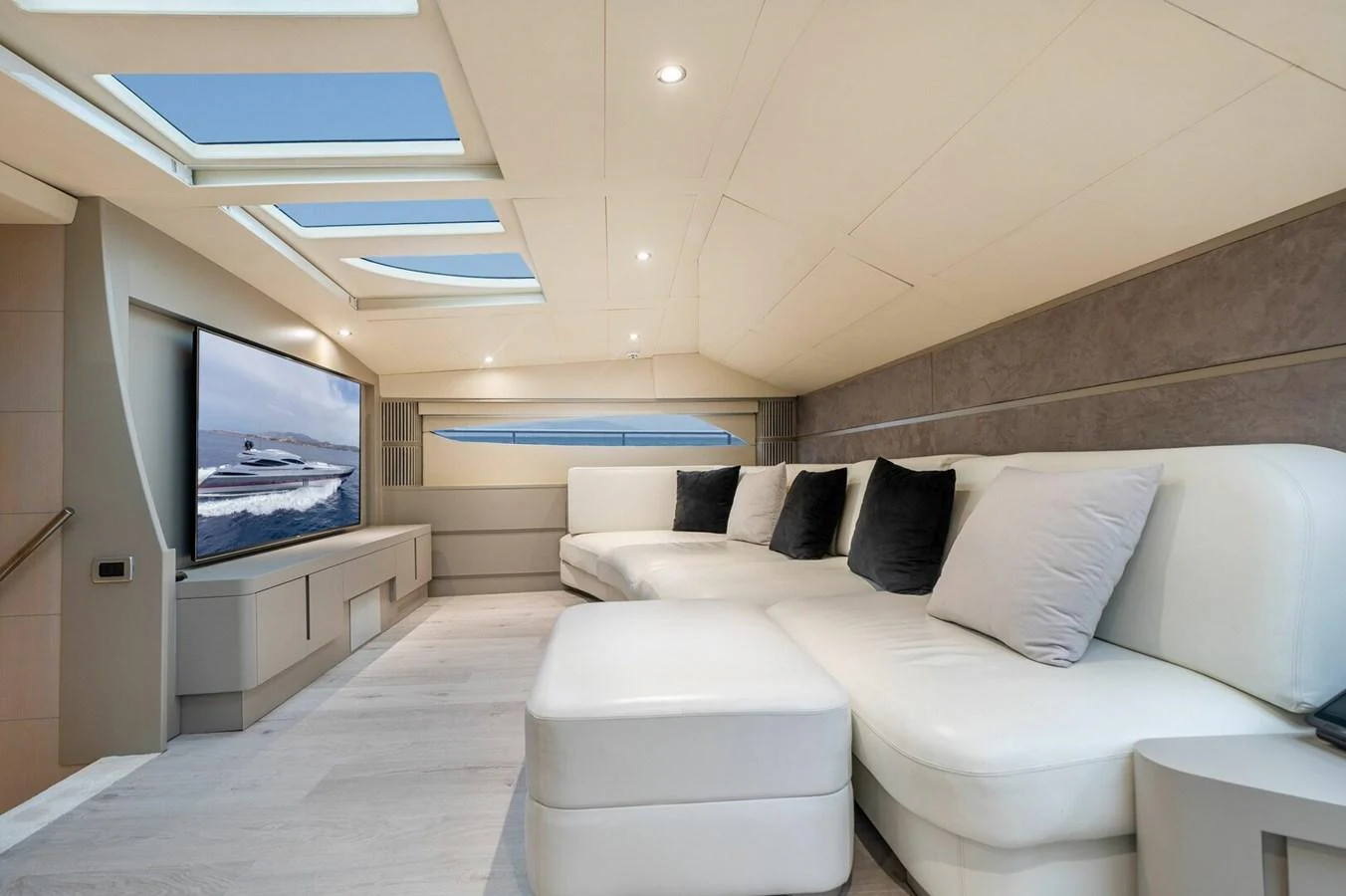 a room with a bed and a tv aboard REBOOT Yacht for Sale