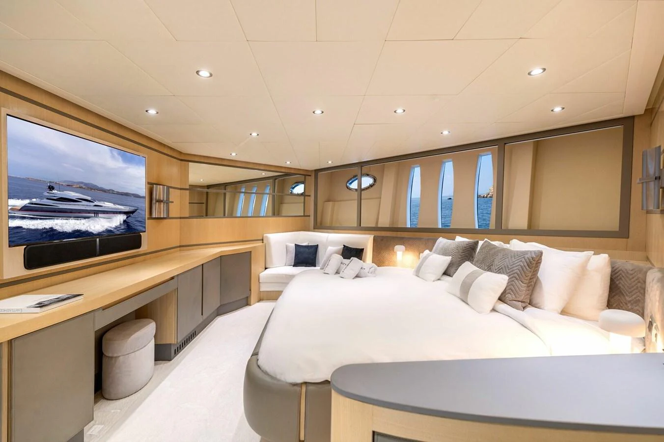 a room with a bed and a tv aboard REBOOT Yacht for Sale