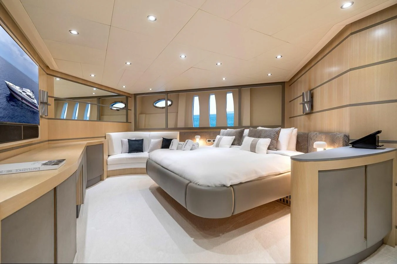 a room with a bed and a desk aboard REBOOT Yacht for Sale