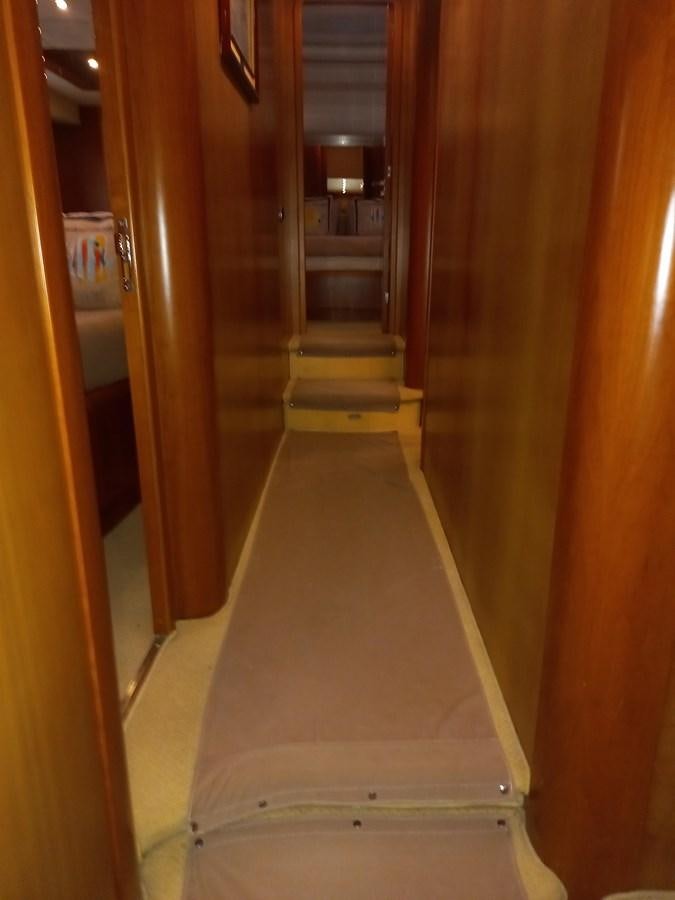 a hallway with a door aboard TANGO - 2003 AZIMUT 85 ULTIMATE @ ACAPULCO Yacht for Sale