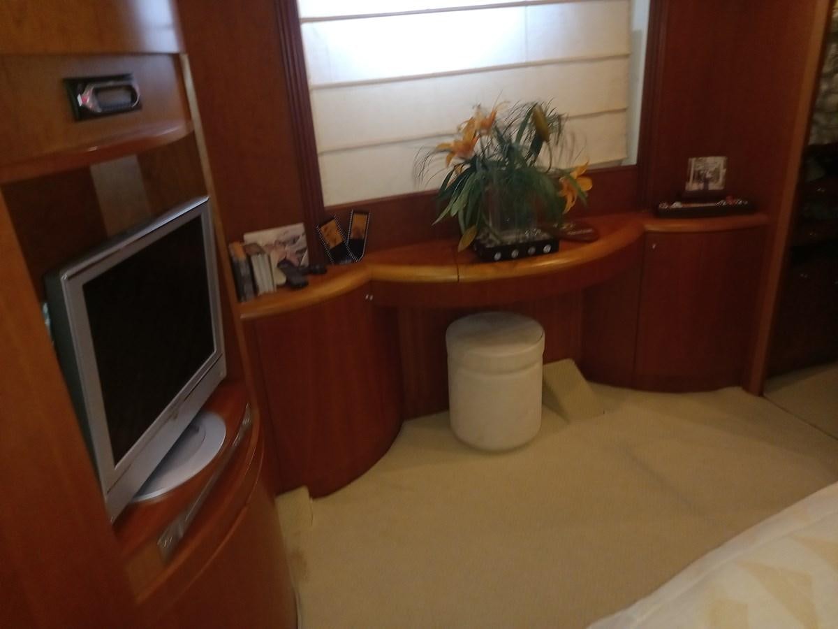 a small potted plant on a counter in a room aboard TANGO - 2003 AZIMUT 85 ULTIMATE @ ACAPULCO Yacht for Sale