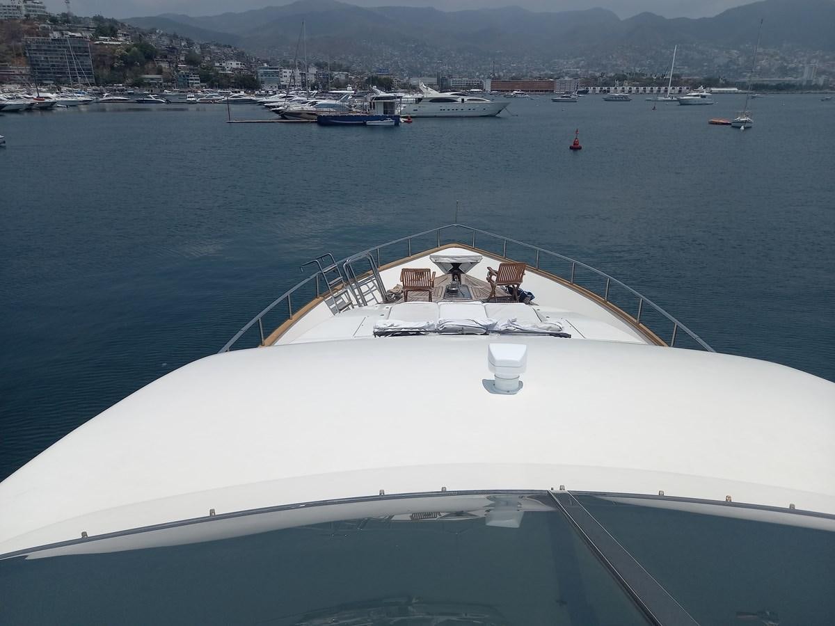 a white yacht in the water aboard TANGO - 2003 AZIMUT 85 ULTIMATE @ ACAPULCO Yacht for Sale