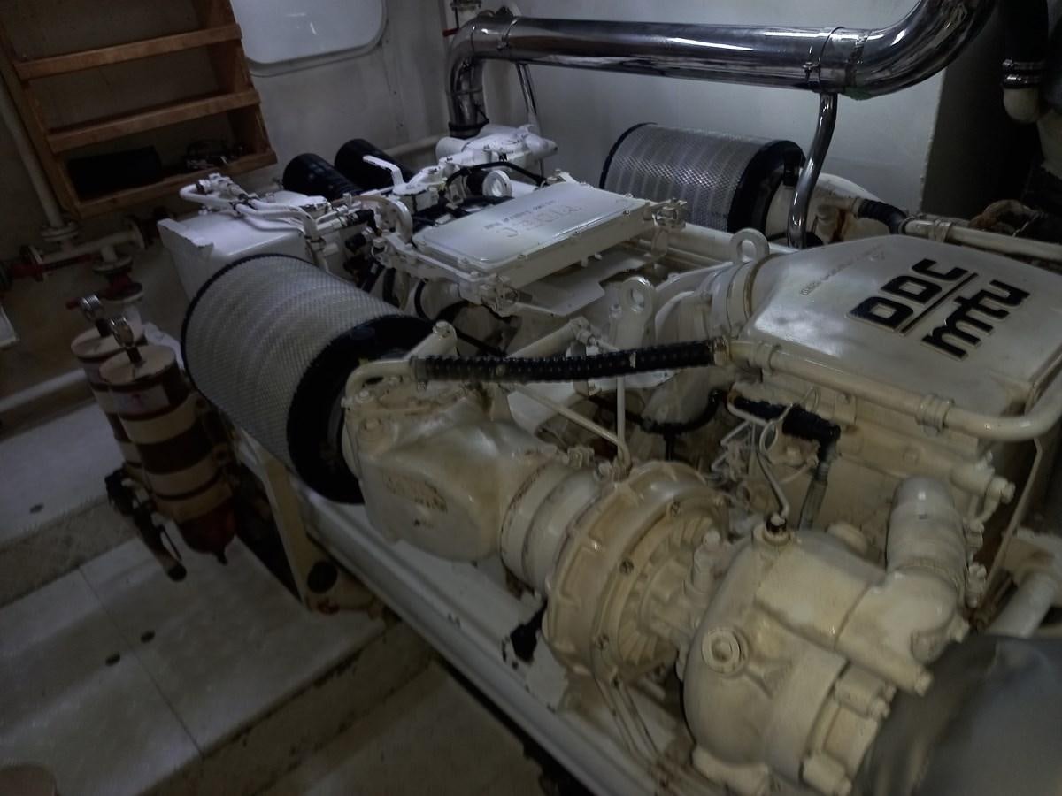 a car engine with a large amount of tires aboard TANGO - 2003 AZIMUT 85 ULTIMATE @ ACAPULCO Yacht for Sale