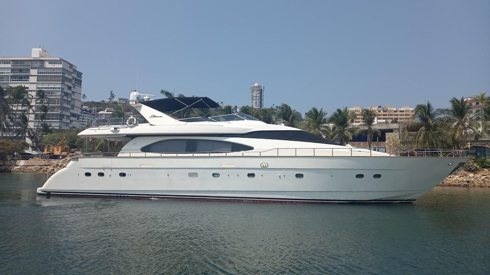 a white yacht in the water aboard TANGO - 2003 AZIMUT 85 ULTIMATE @ ACAPULCO Yacht for Sale