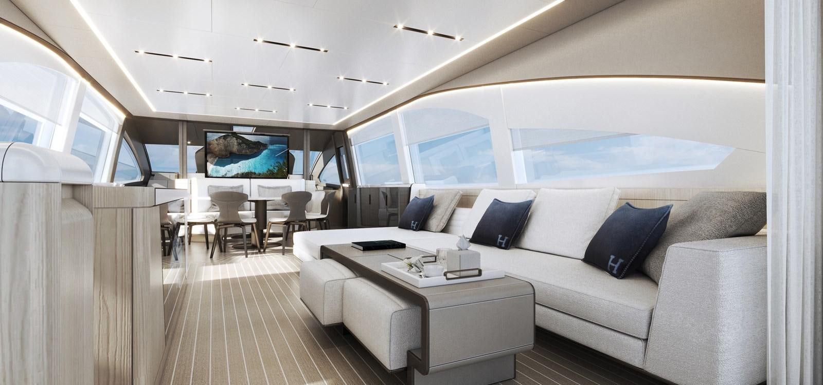 a room with a couch and a table aboard NEW GLADIATOR 961 SPEED Yacht for Sale