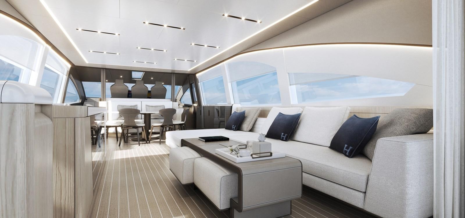 a large white room with a couch and a table aboard NEW GLADIATOR 961 SPEED Yacht for Sale