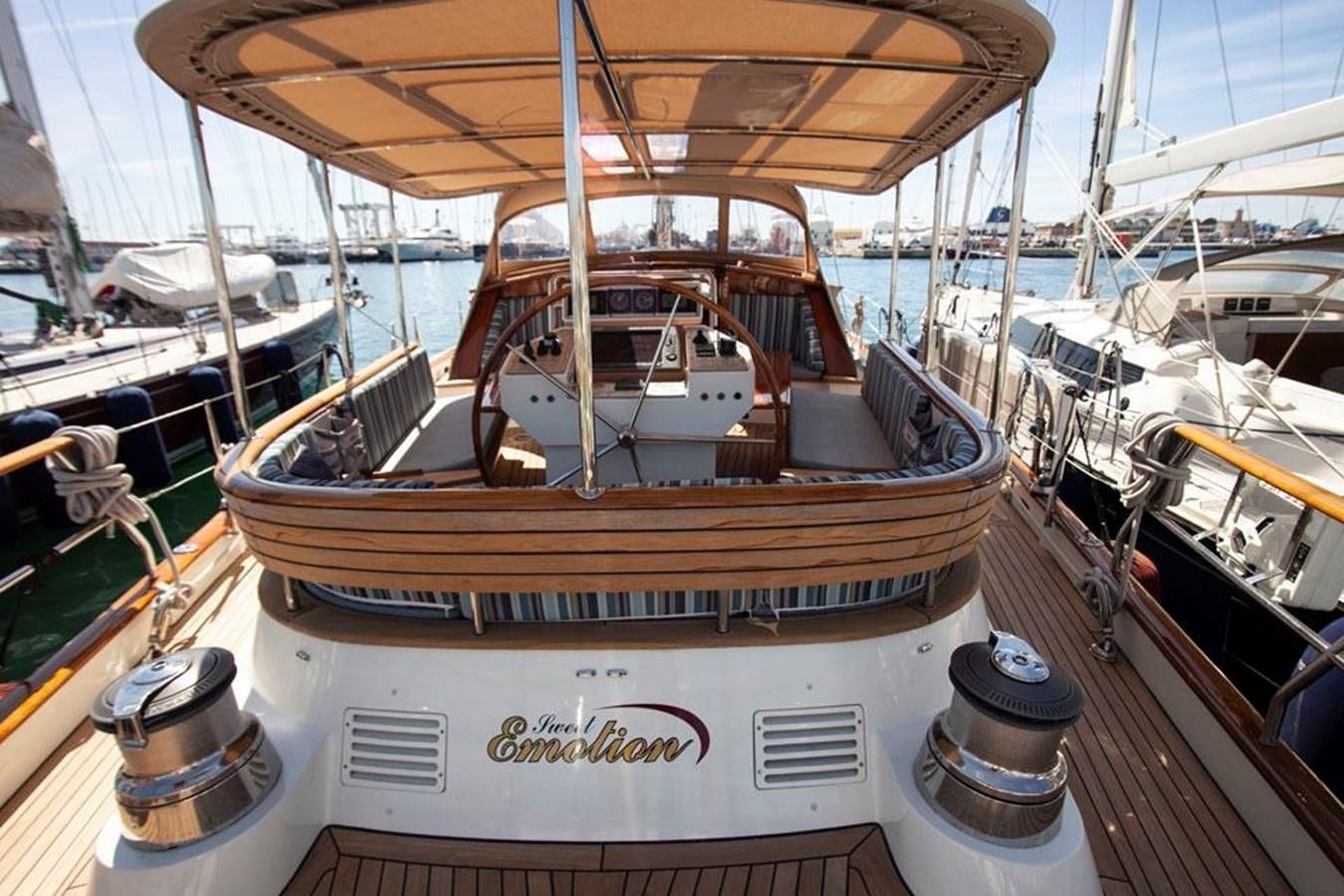 a boat in a harbor aboard SWEET EMOTION Yacht for Sale