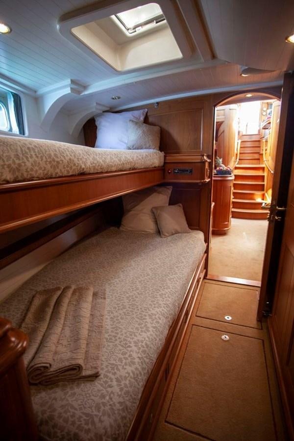 a bed in a room aboard SWEET EMOTION Yacht for Sale