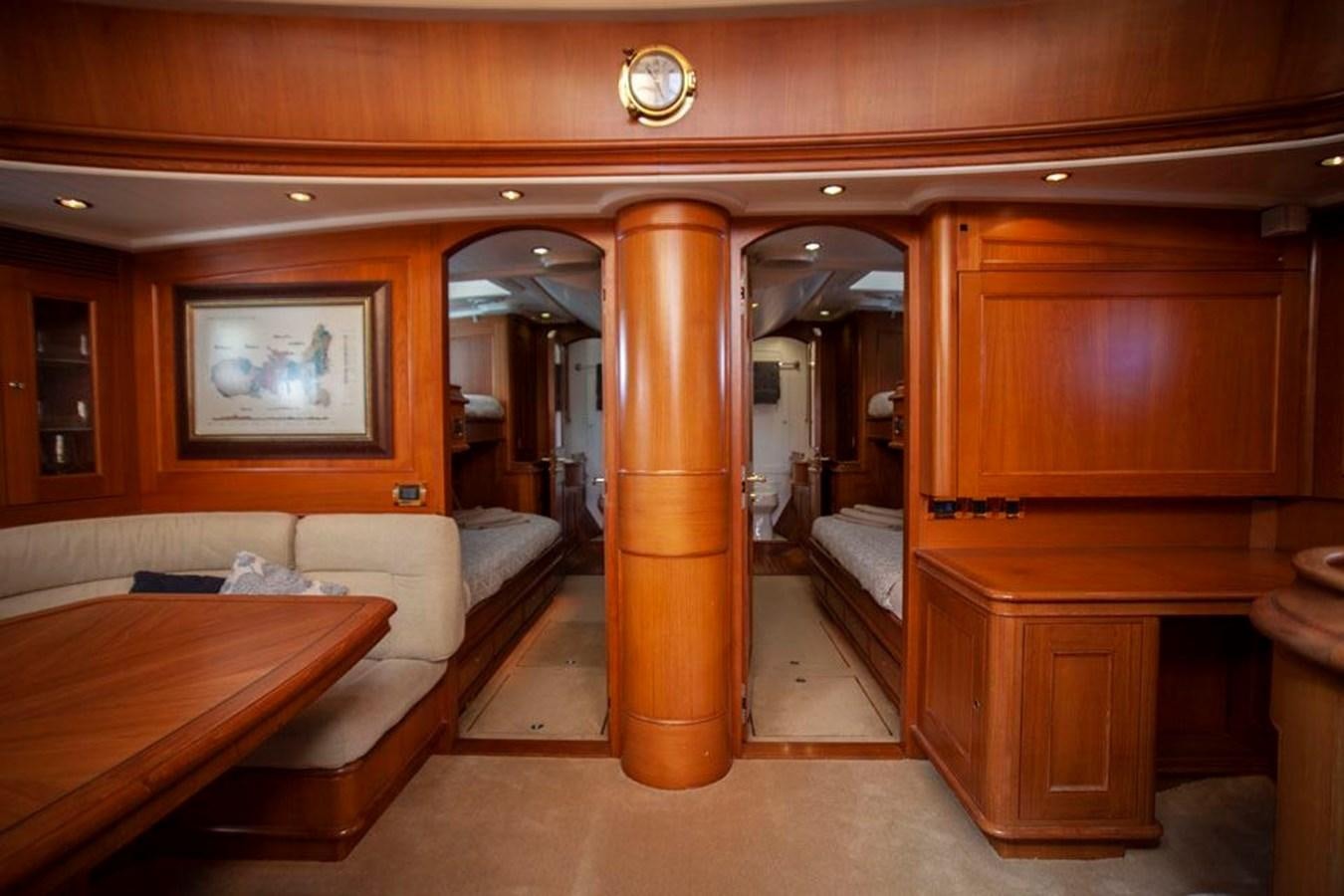 a room with a couch and a table aboard SWEET EMOTION Yacht for Sale