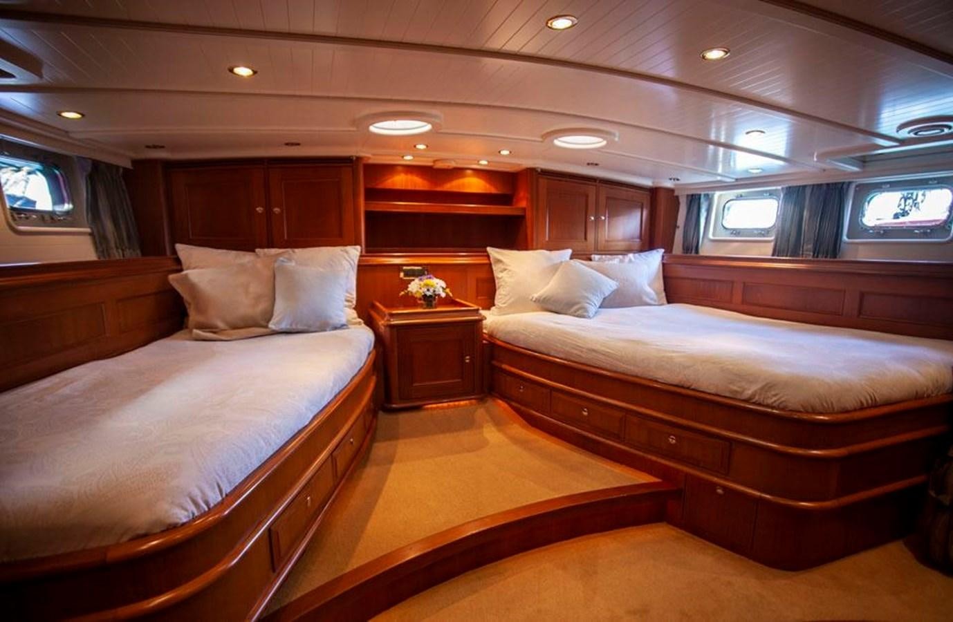 a room with two beds aboard SWEET EMOTION Yacht for Sale