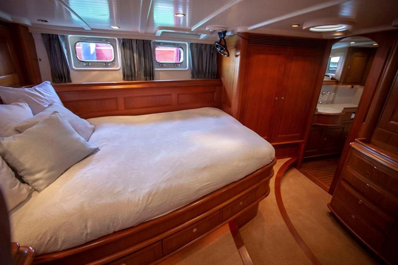 a bed in a room aboard SWEET EMOTION Yacht for Sale