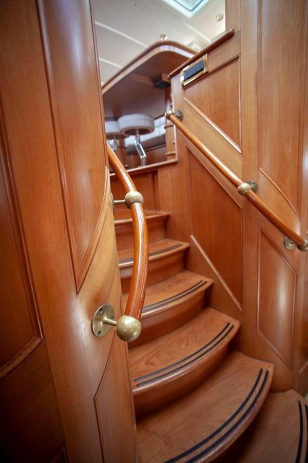 a wooden toilet with a wooden seat aboard SWEET EMOTION Yacht for Sale